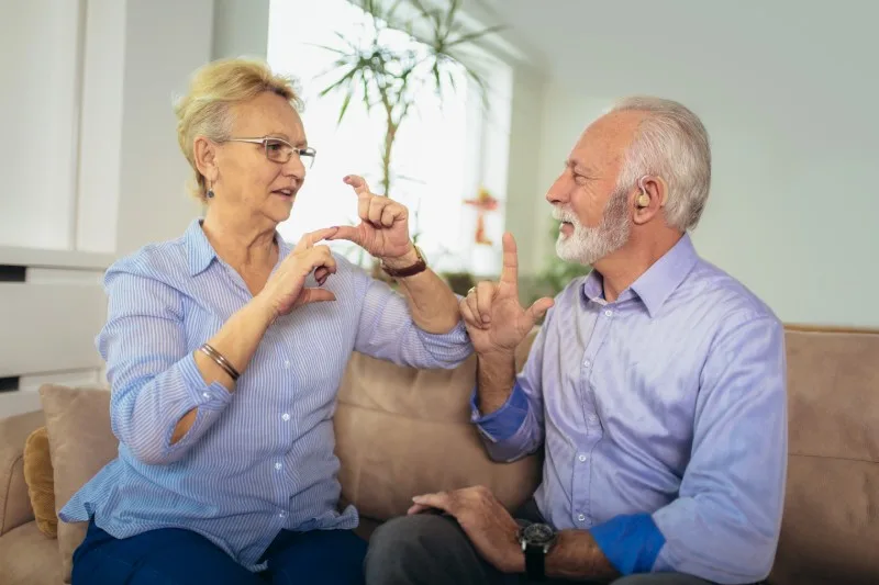 Older adults using sign language together