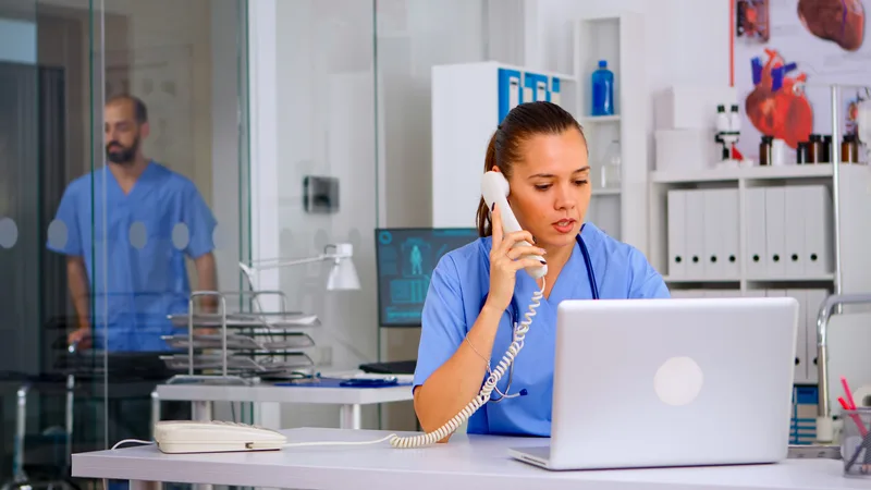 Medical staff talking with a patient on the phone