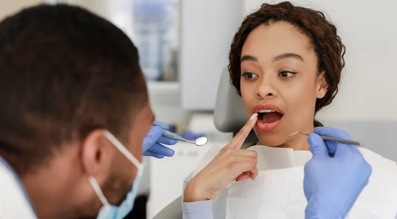 Young woman receiving dental exam